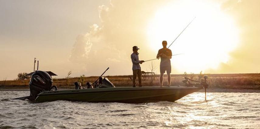 Winter Bass Fishing silhouetted on the water