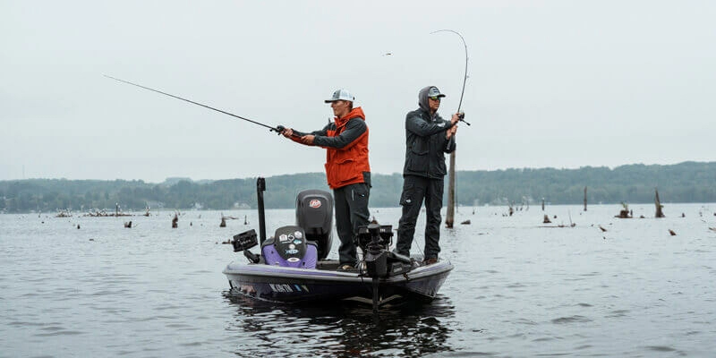 Two anglers fishing from a boat